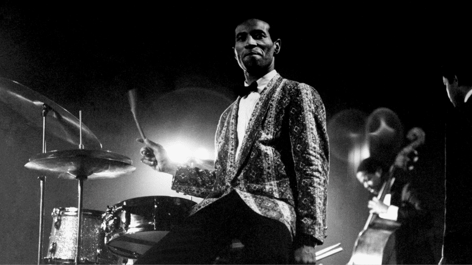 Max Roach playing drums