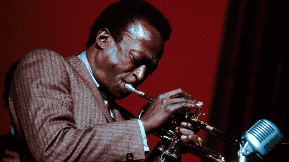 Miles Davis performing on stage