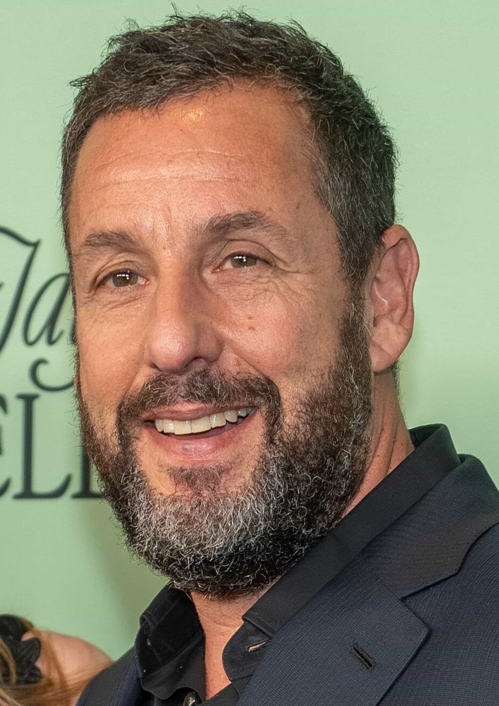 Portrait photograph of Adam Sandler, American Jewish comedian and actor known for his long career in comedy films and later dramatic roles (1)