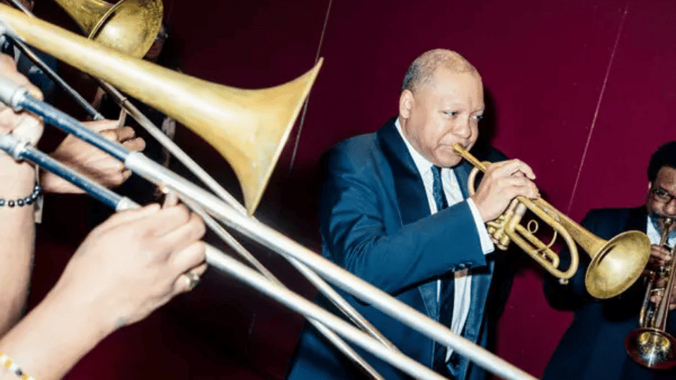 Wynton Marsalis performing with a group of musicians