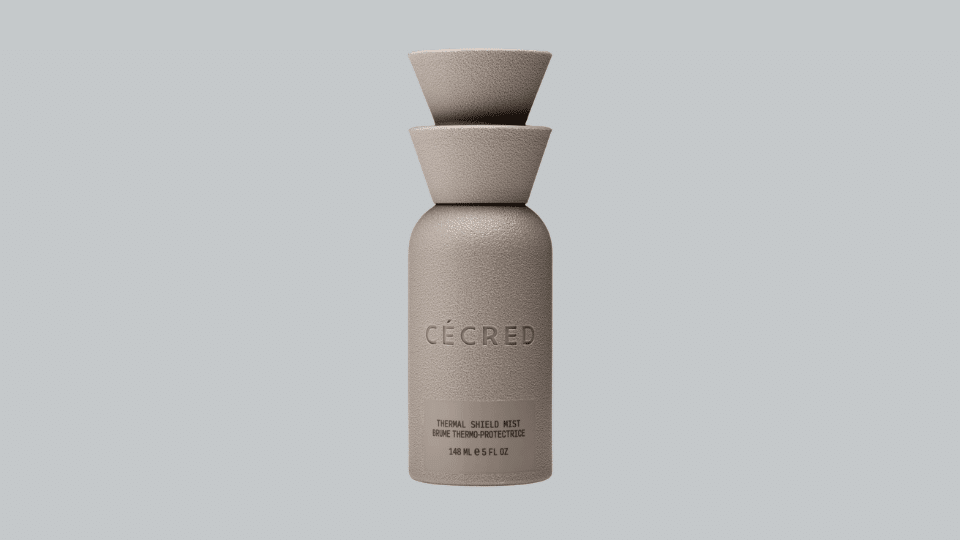 Cécred Thermal Shield Mist bottle on plain background