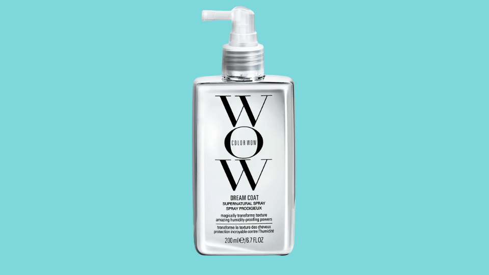Clear spray bottle of hair heat protectant on light background, sleek and modern packaging