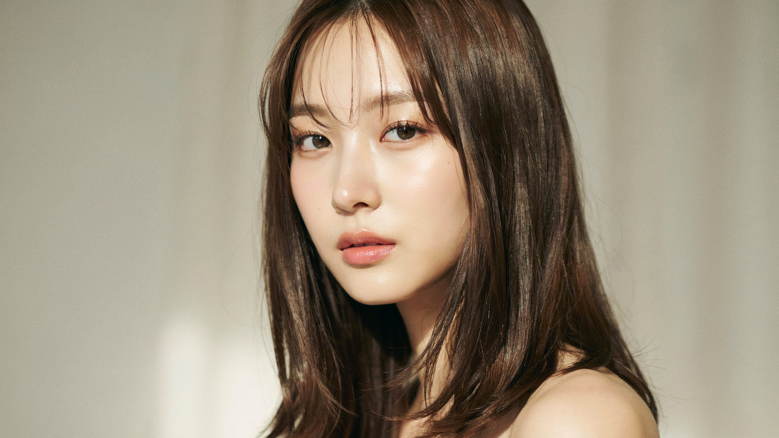 Korean see through fringe with fine sparse strands sitting lightly across the forehead paired with long straight hair