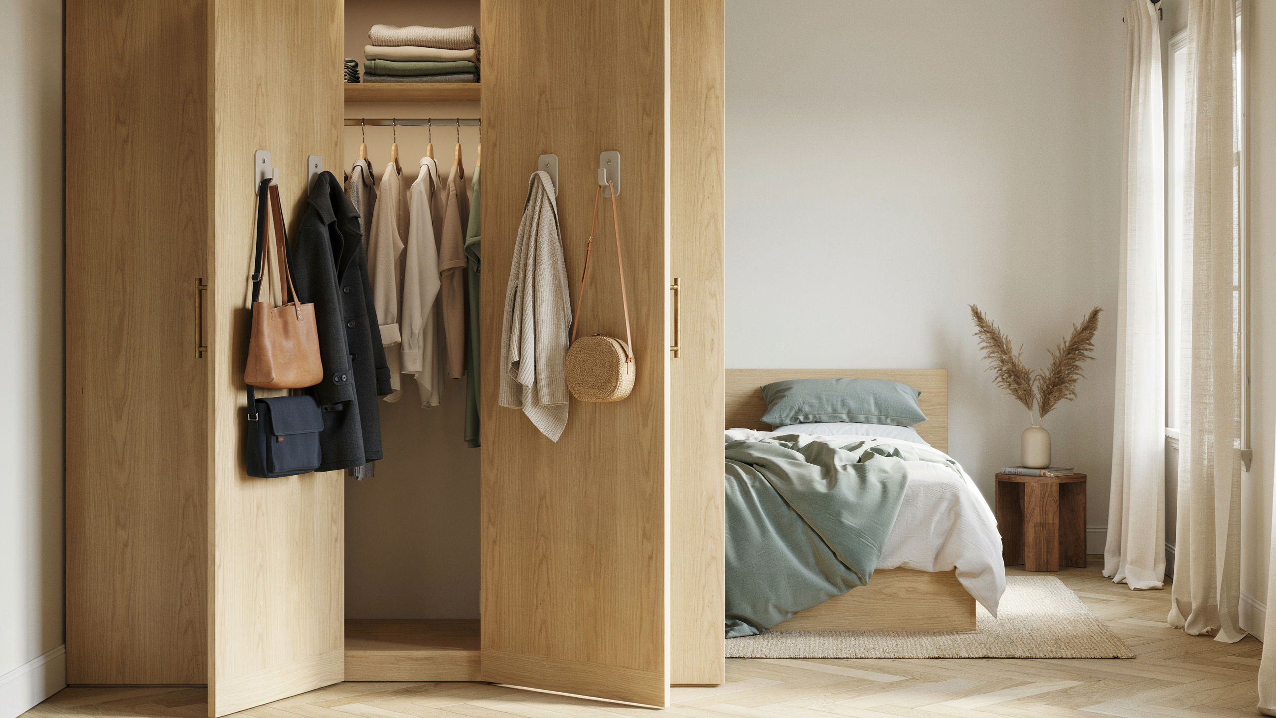 Back of wardrobe with adhesive hooks holding jackets and bags, realistic small-space storage setup.