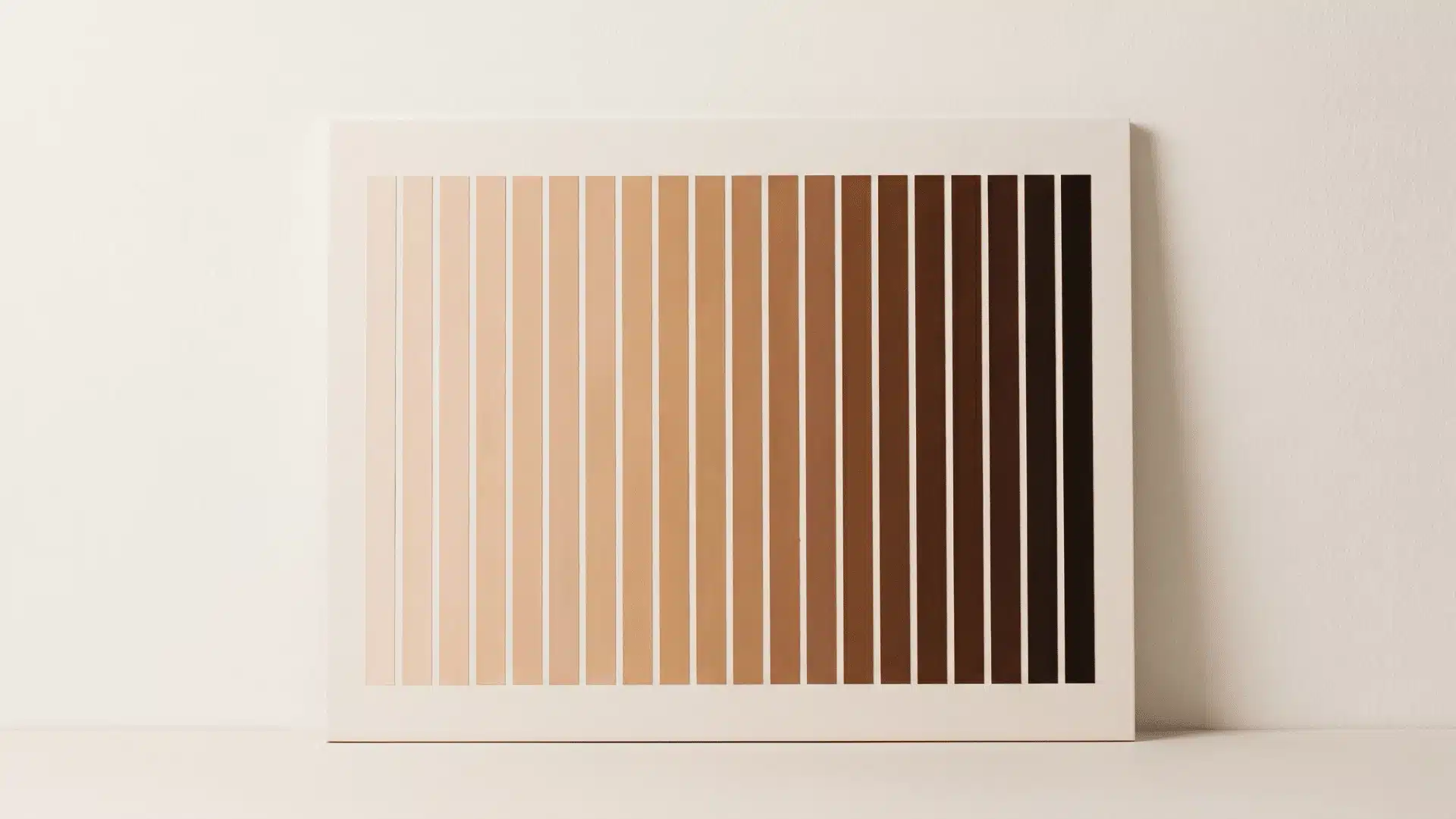 Range of foundation shade tones arranged in smooth gradient progression on a neutral background.