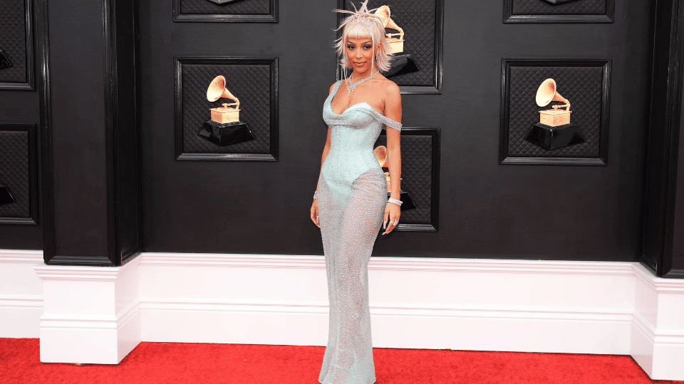 Doja Cat with her hair styled in spike high bun at the Grammy's