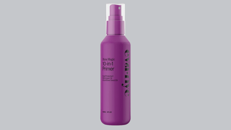 Eva NYC Mane Magic 10-in-1 Primer bottle on plain background