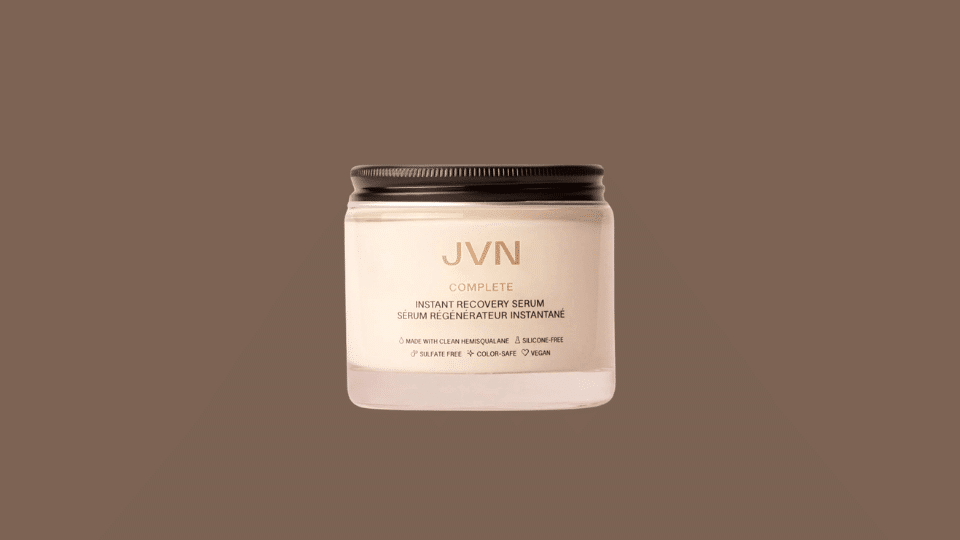 JVN Complete Instant Recovery Heat Protectant Serum bottle on plain background