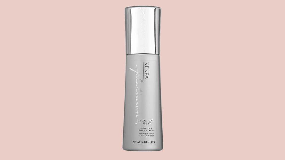 Kenra Platinum Blow-Dry Spray bottle on plain background