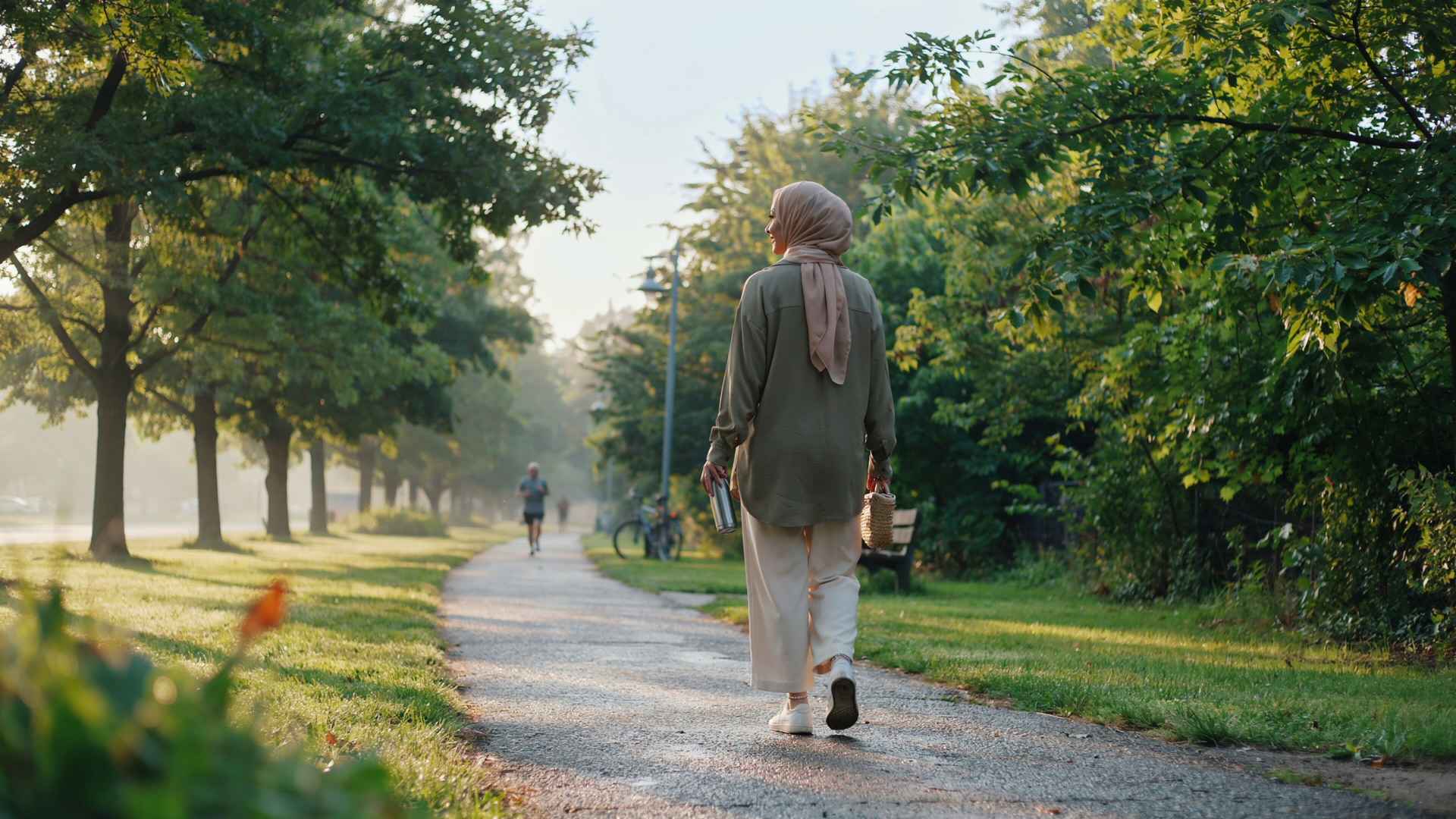Person enjoying sunlight and nature outdoors