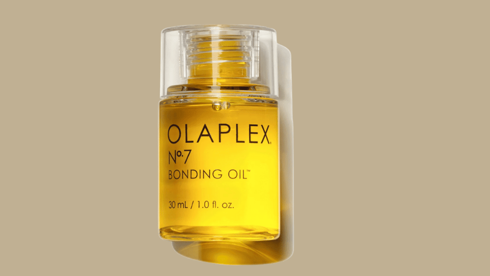 Olaplex No. 7 Bonding Hair Oil bottle on plain background