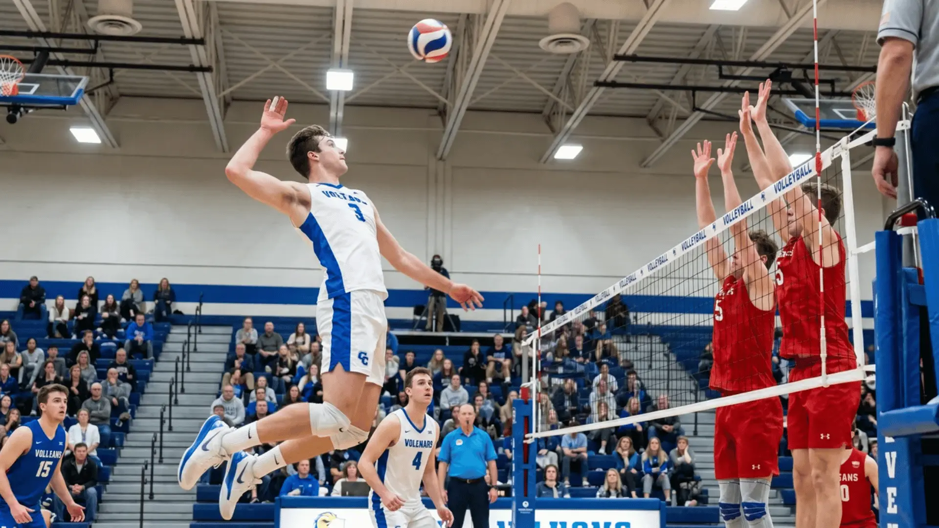 Outside hitter attacking a volleyball from the left side of the court