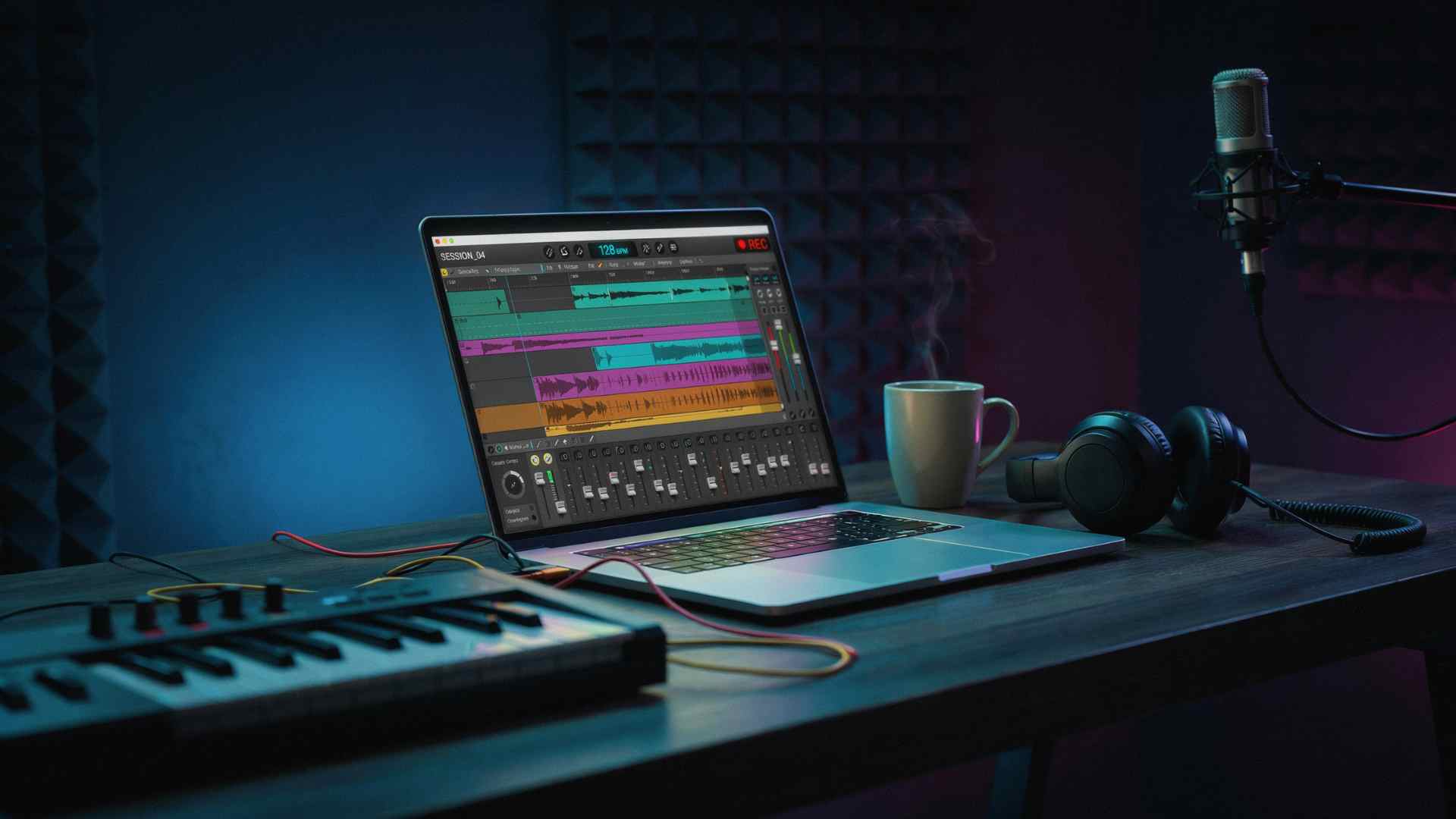 Dark home studio with a glowing DAW interface on a laptop screen and studio headphones on the desk