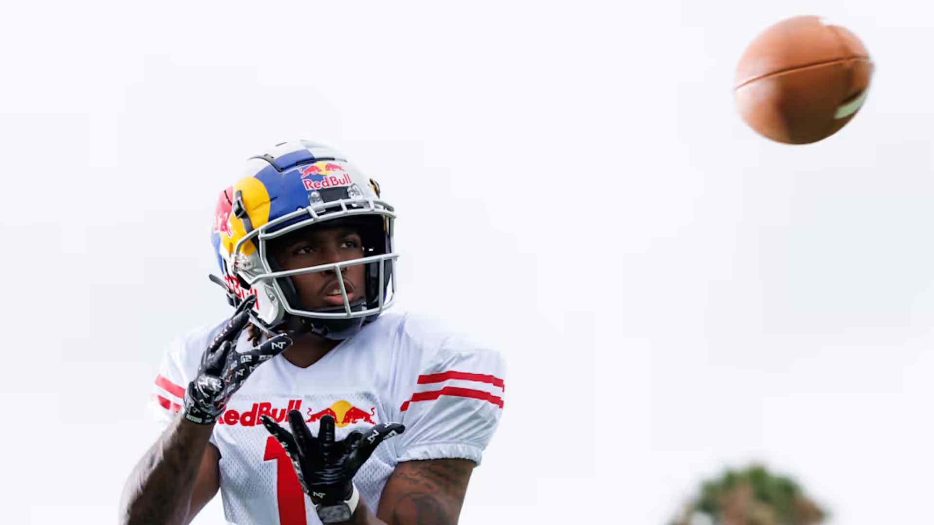 Football player mid throw during a game play