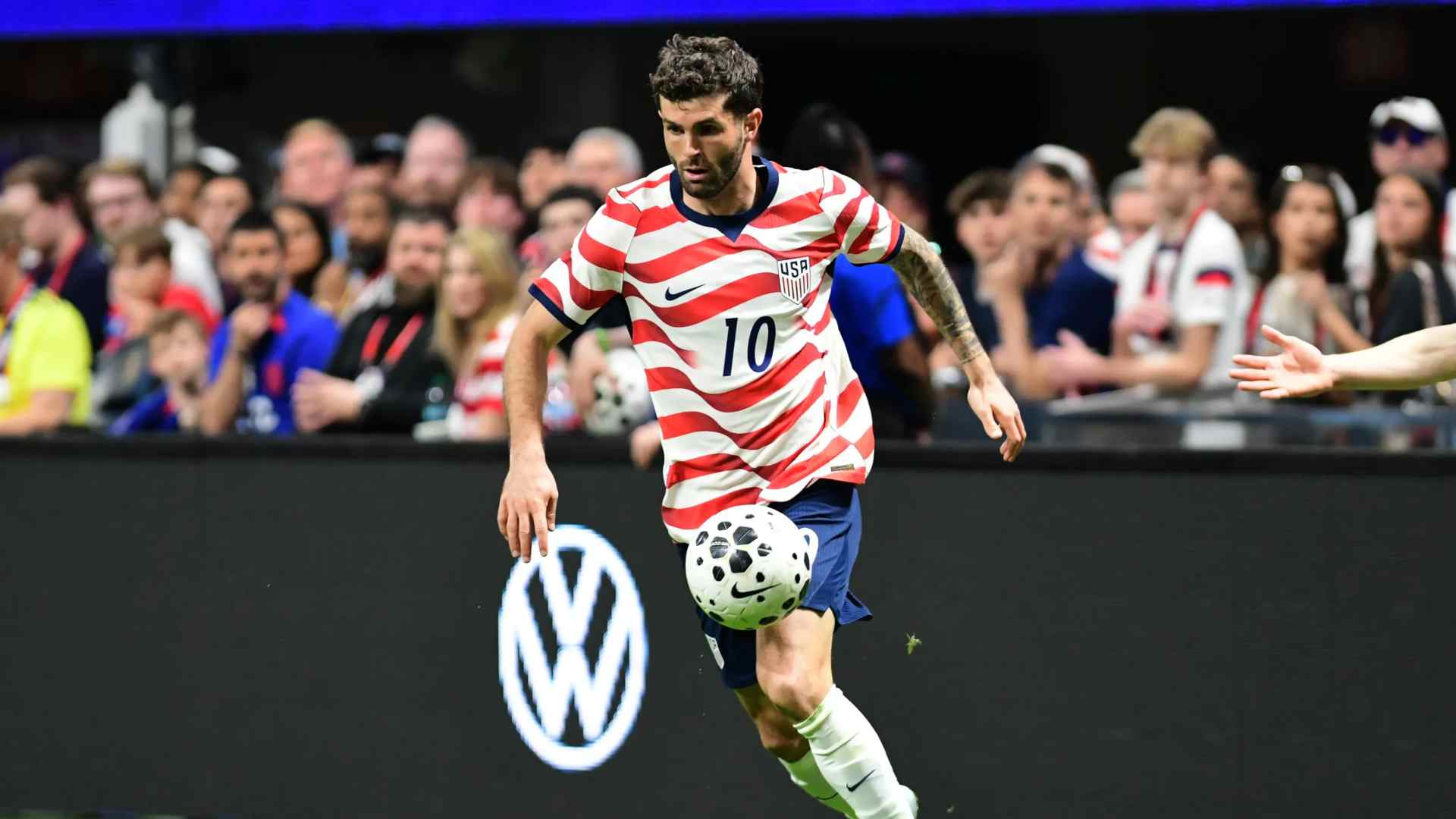 Soccer player passing the ball during a match