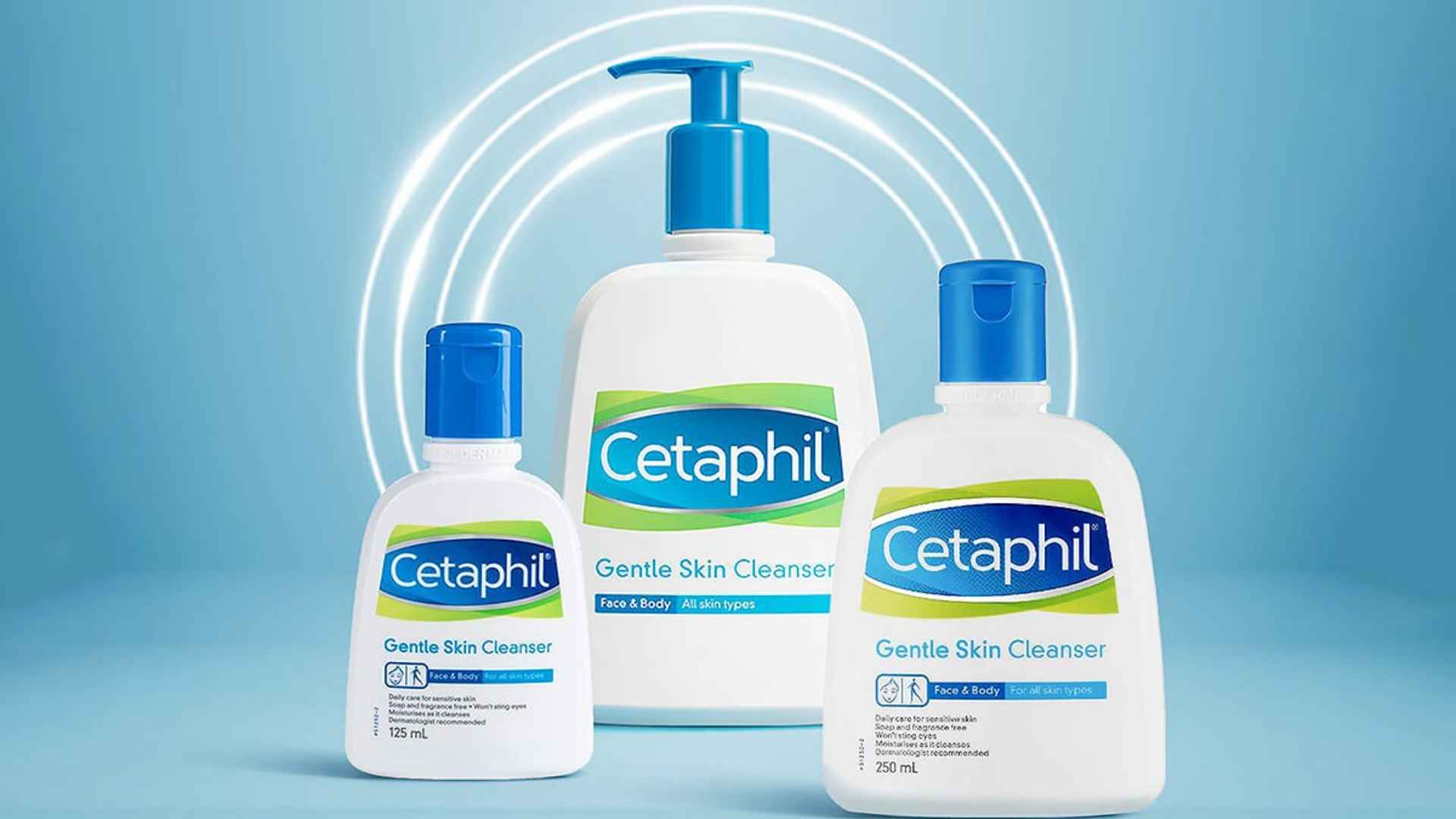 Cetaphil Gentle Skin Cleanser bottles displayed in a skincare product arrangement