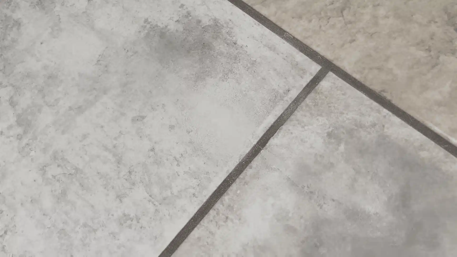 Inspecting a repaired tile surface after filling and blending the cracked area