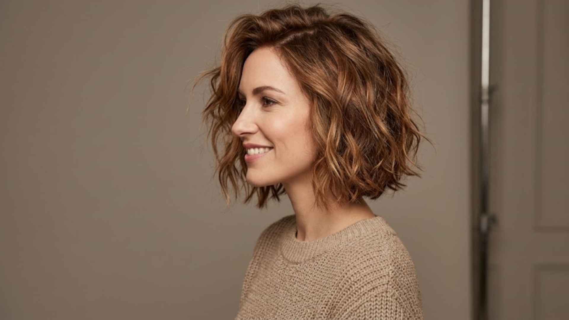 Woman with a choppy layered bob featuring textured jagged layers and natural movement.