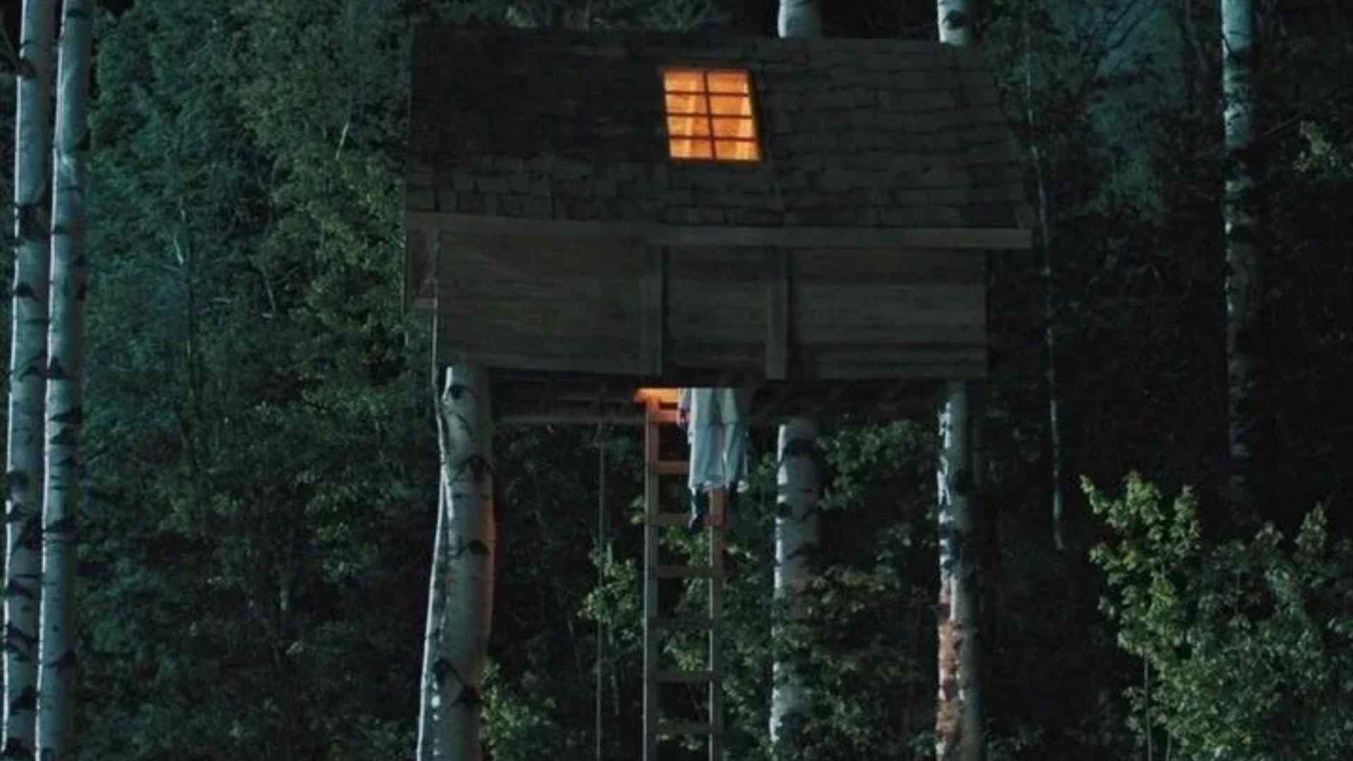 Final treehouse scene from Hereditary showing the cult gathering