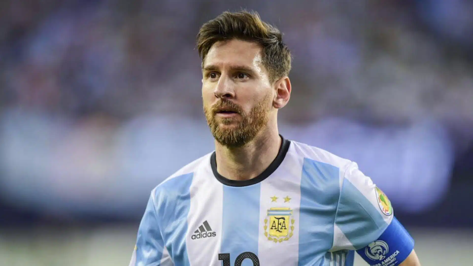Lionel Messi wearing Argentina’s national team jersey during a football match.