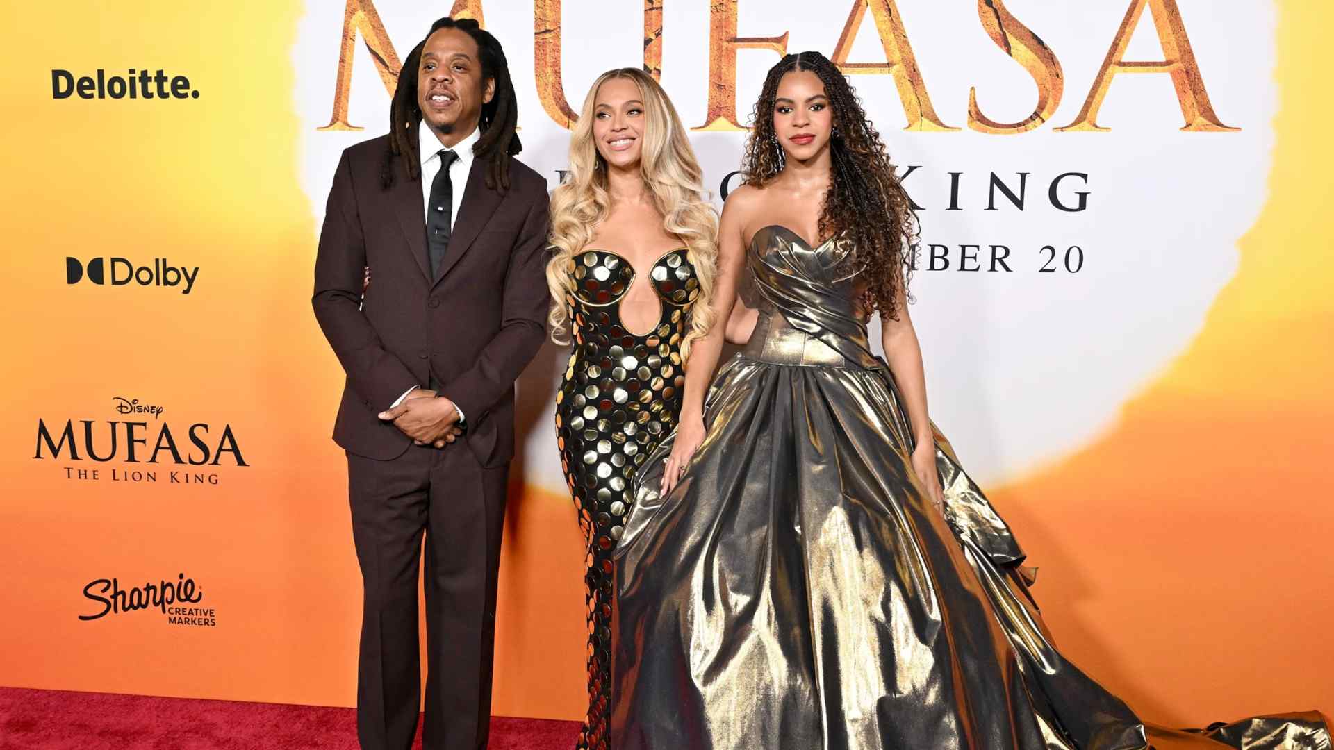 Blue Ivy Carter with parents Beyoncé and Jay Z