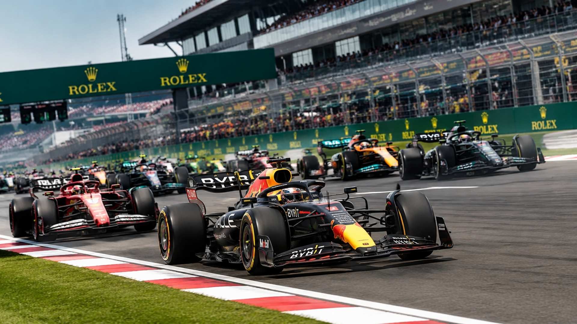 Formula 1 cars race wheel to wheel at a Rolex sponsored track