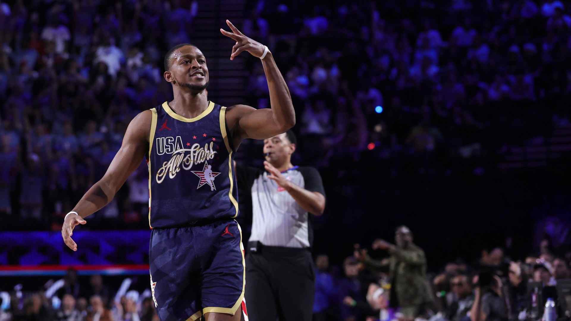 NBA player shooting a three pointer during a game