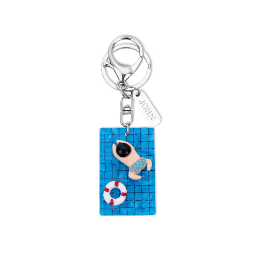 9. Personalized Swimming Pool Cartoon Character Keychain