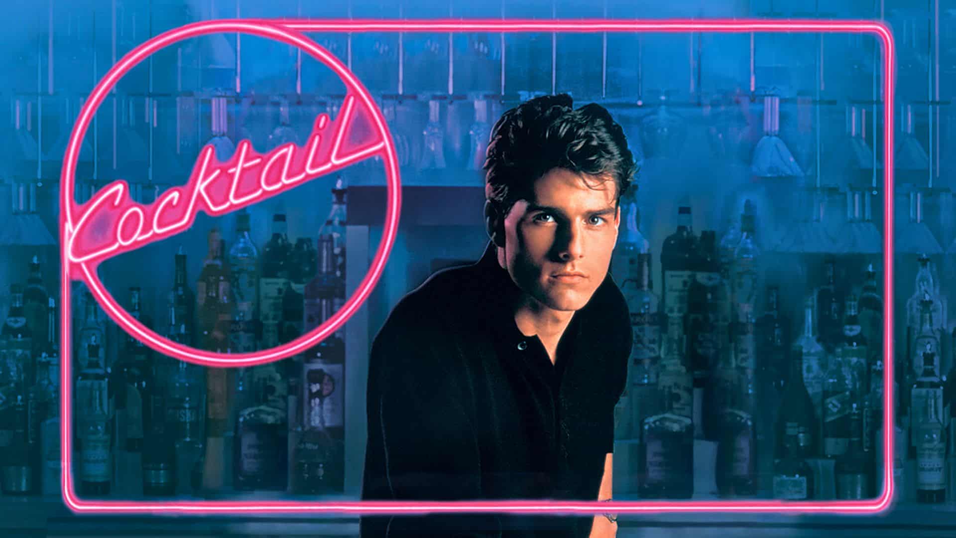 Man standing at bar with liquor bottles, pink neon