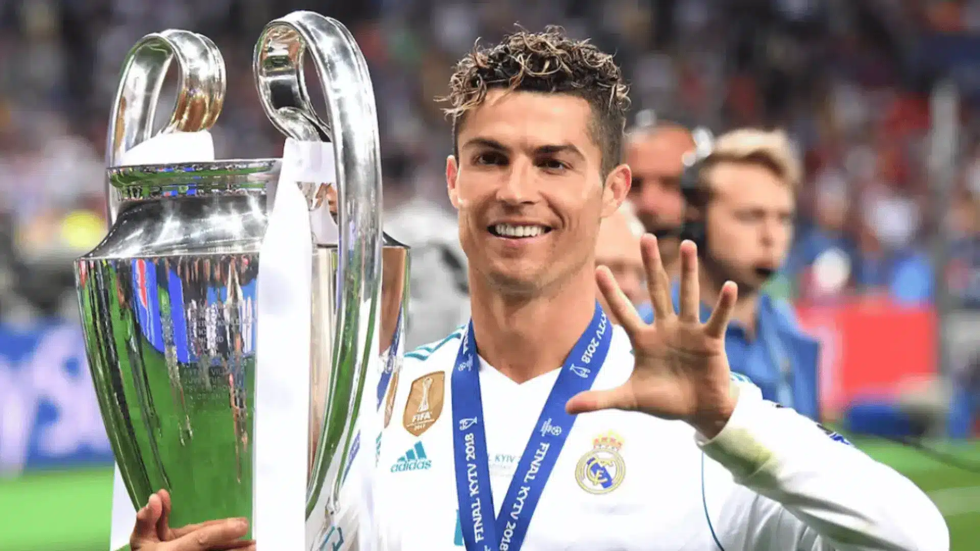 Cristiano Ronaldo holds the UEFA Champions League trophy after Real Madrid’s 2018 final victory.