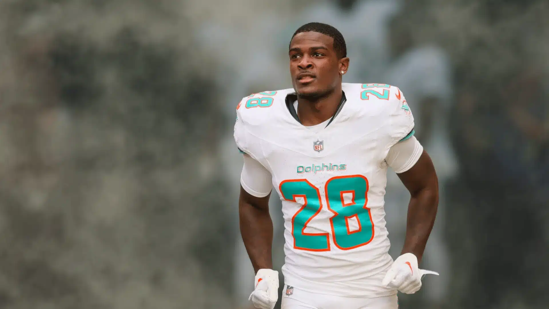 Devon Achane wearing a Miami Dolphins uniform on the field