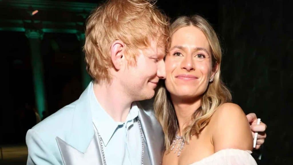 Ed Sheeran and Cherry Seaborn sharing a close moment at an event