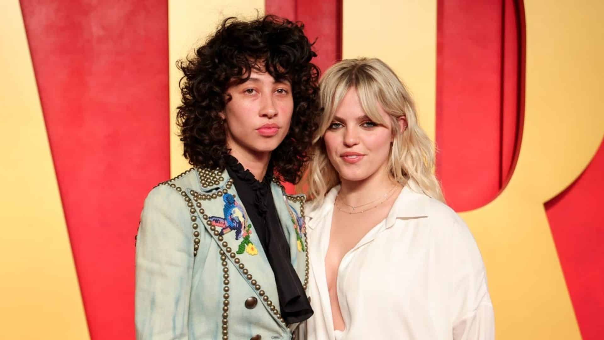 Reneé Rapp posing with girlfriend Towa Bird at a red carpet event.