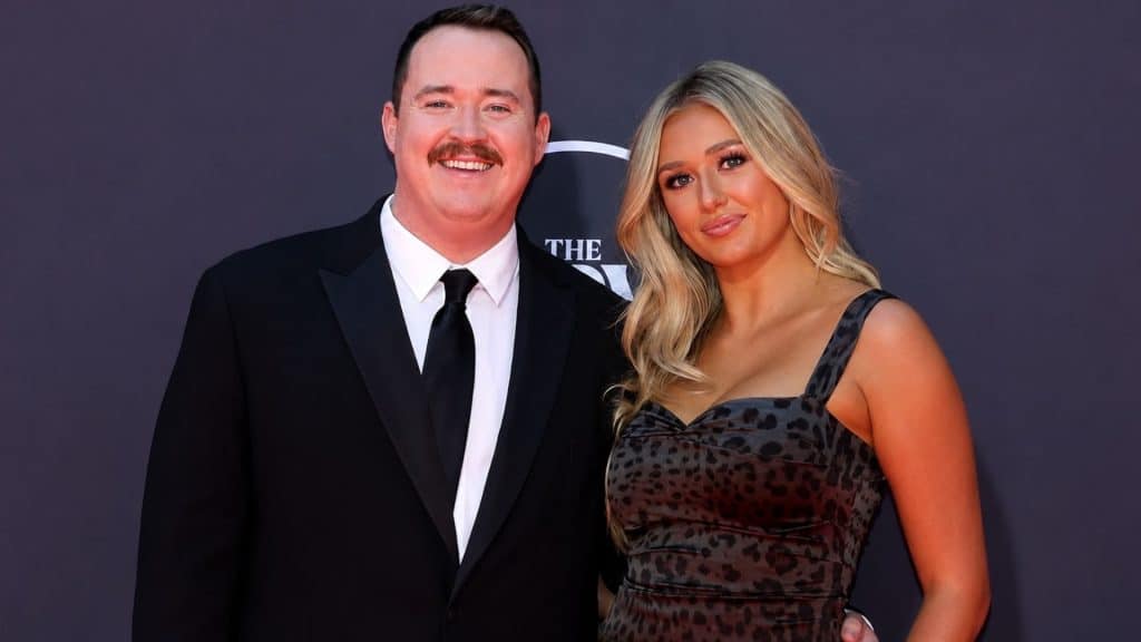 Shane Gillis with ex-girlfriend Grace Brassel posing together at a public event.