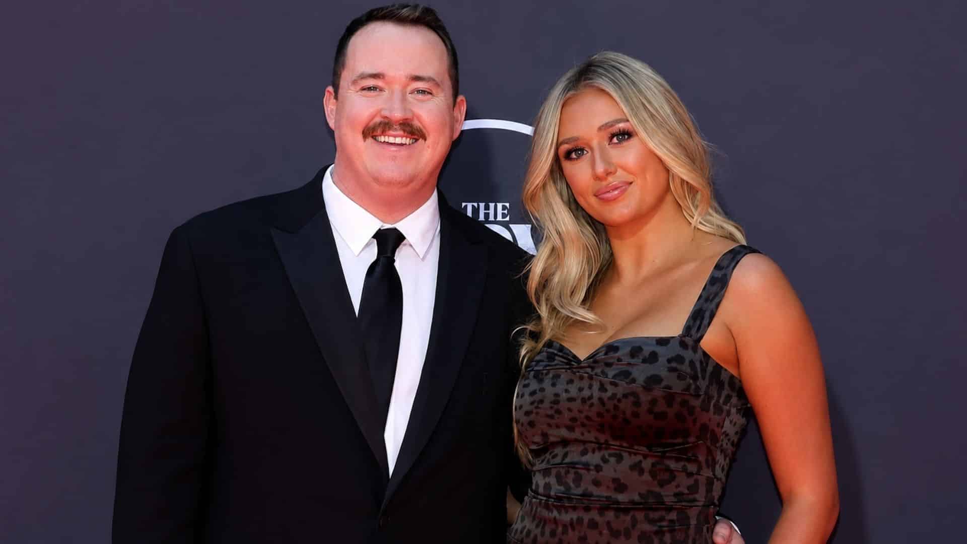 Shane Gillis with ex-girlfriend Grace Brassel posing together at a public event.