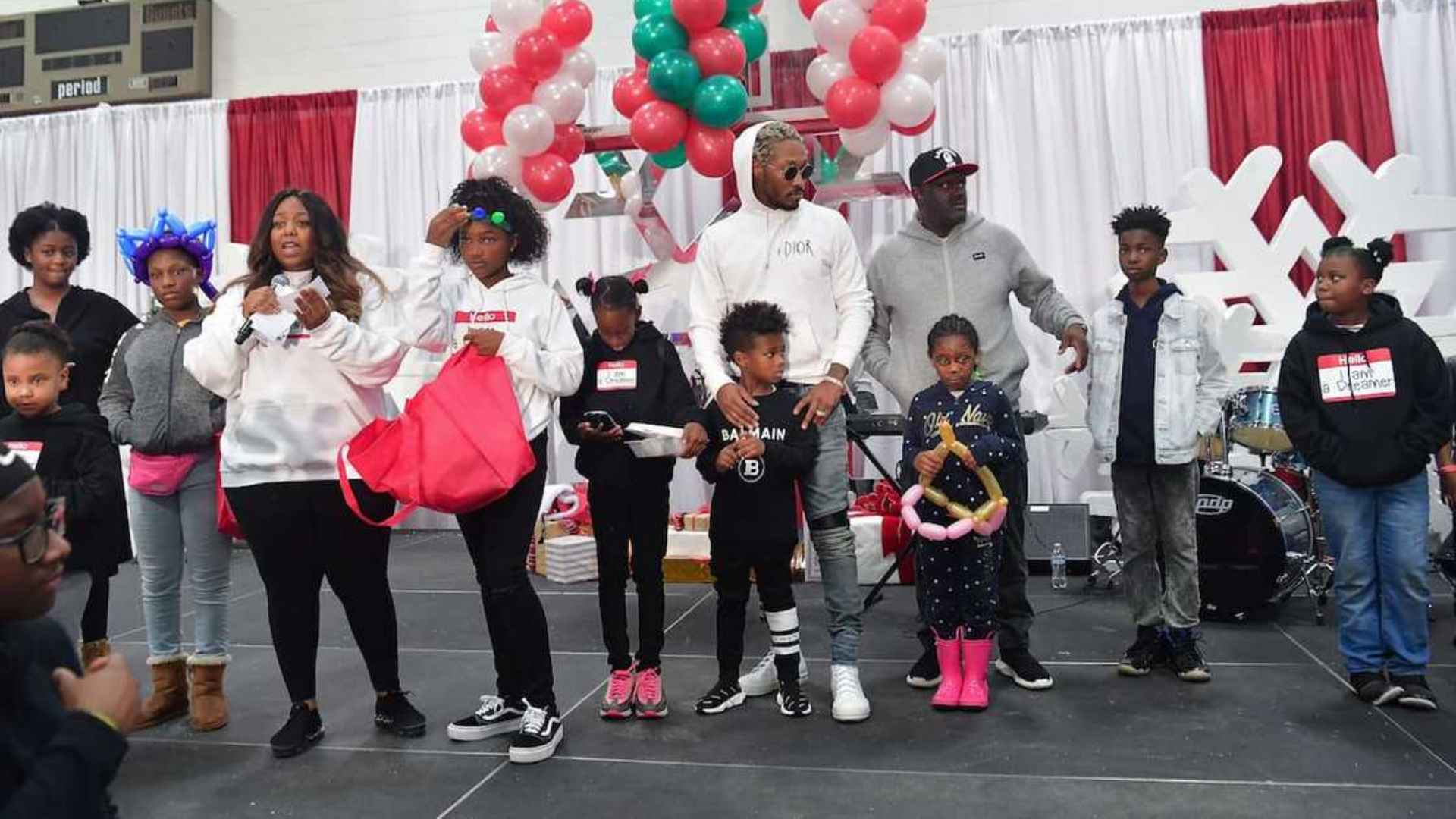 Future attending a family event with children at the FreeWishes Foundation celebration.