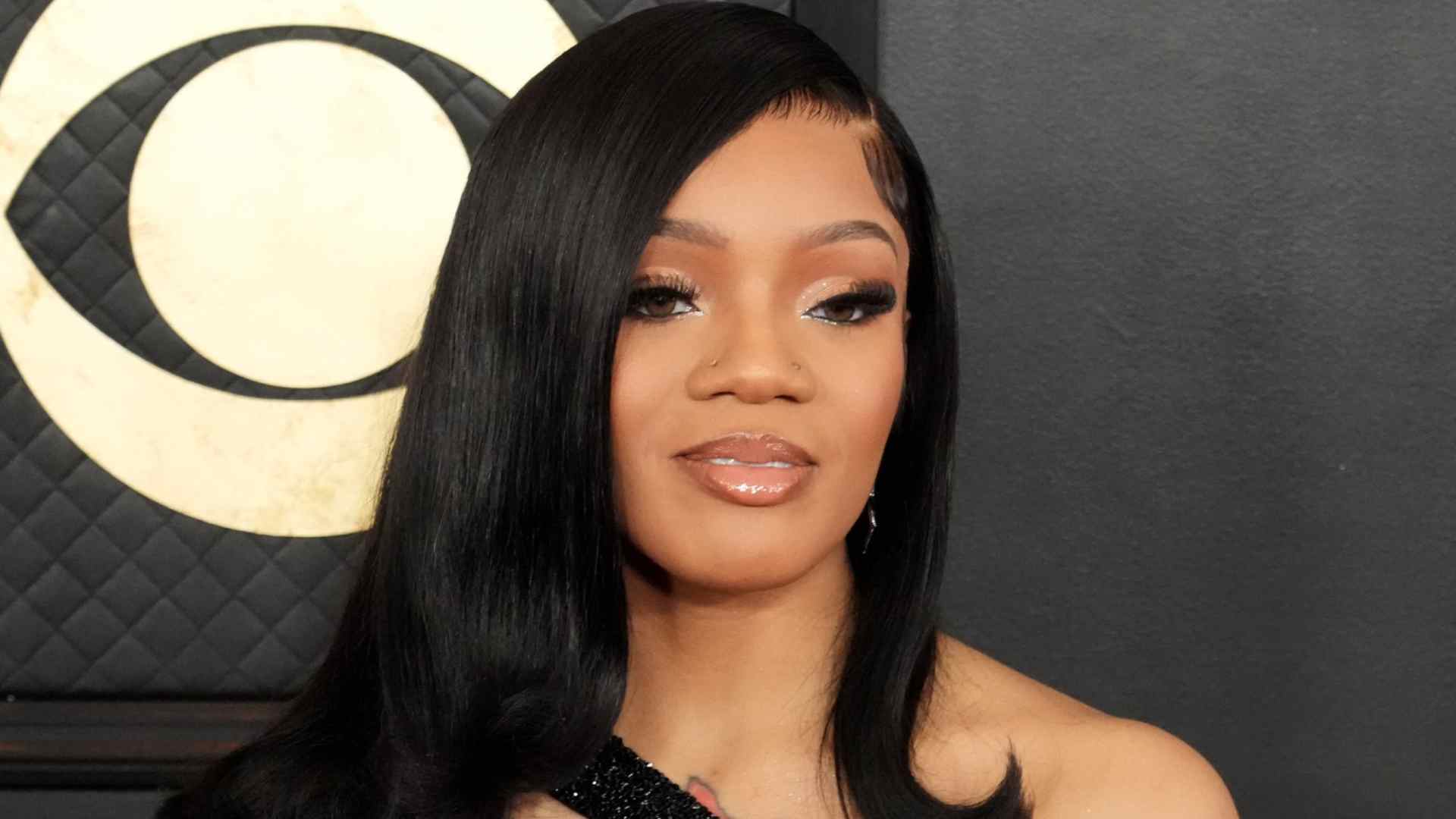 GloRilla smiling during her grammy appearance and popularity gain