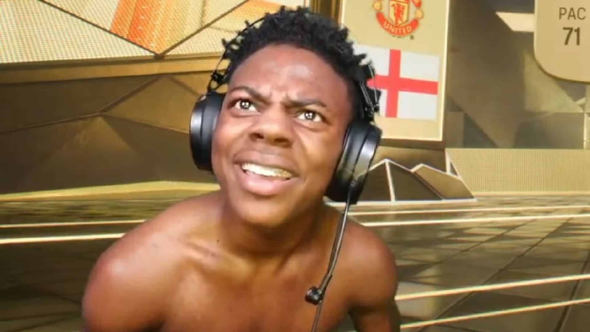 IShowSpeed wearing headphones during a gaming livestream with a virtual basketball court displayed behind him