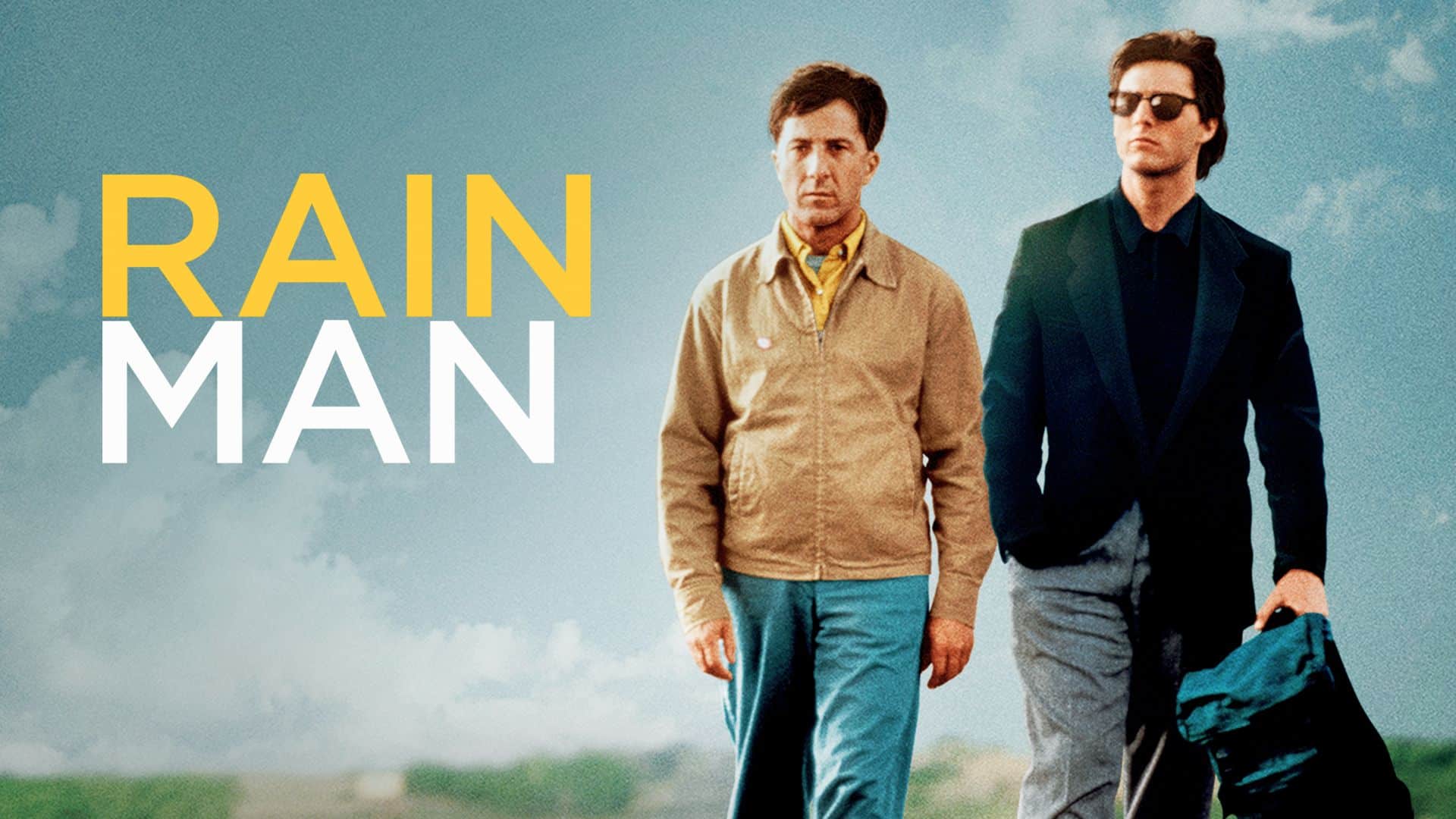 Two men walking side by side under a cloudy sky,