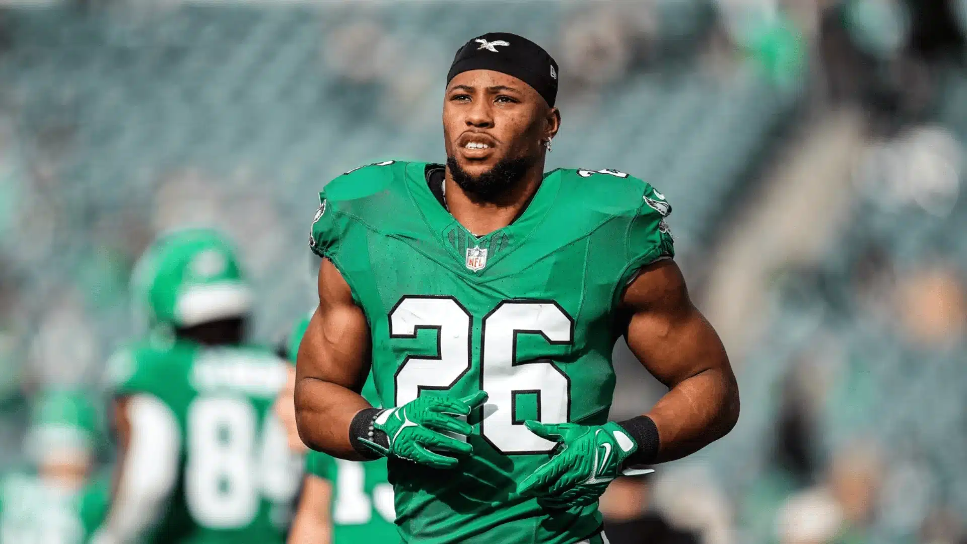 Saquon Barkley wearing a Philadelphia Eagles uniform on the field saquon-barkley-eagles-field-portrait