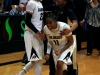 Chucky Jeffery 23 and Brittany Wilson 11 celebrate after defeating the number 8 ranked team, Louisville 70-66. (Amy Leder/CU Independent)