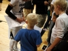 Chucky Jeffery signs autographs for kids after winning the game against Louisville 70-66, Friday Night in the Coors Events Center. (Amy Leder/CU Independent)