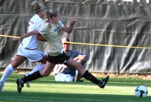 While playing earlier this season, senior forward Nikki Marshall strides past Oklahoma defense. The Buffs had a 5-2 victory over the visiting Sooners Oct. 2. While playing in Austin Sunday, CU lost to the Texas Longhorns 1-0. (CU Independent file/Ilana Finer)